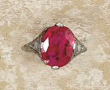 Appraisal: ART DECO RUBY AND DIAMOND RING Centering upon an oval