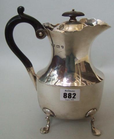 Appraisal: A late Victorian silver hot water jug of oval form