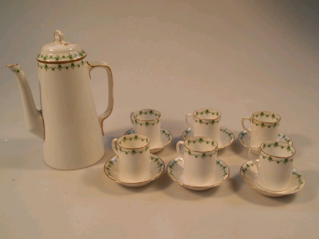 Appraisal: A Royal Worcester bone china part coffee service printed with