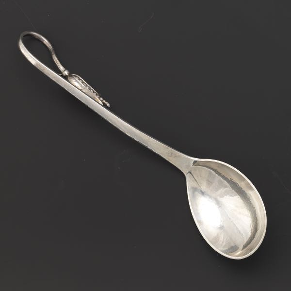 Appraisal: CARL PAUL PETERSEN STERLING SILVER SERVING SPOON Hand hammered serving