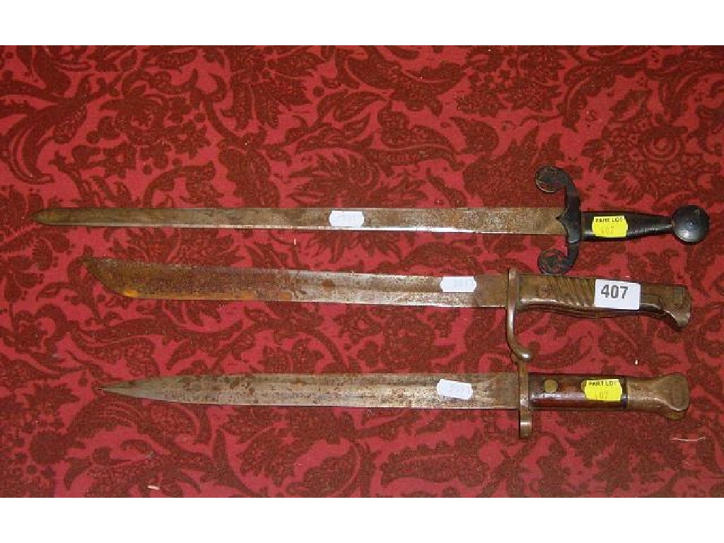 Appraisal: Two World War I bayonets and a further continental toy