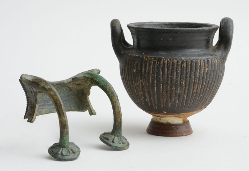 Appraisal: BUCCHERO POTTERY REEDED TWO-HANDLED JAR AND A ROMAN BRONZE MOUNT