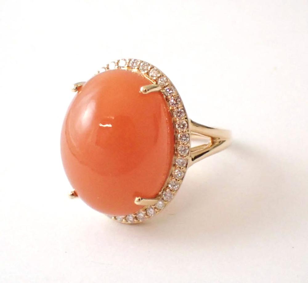 Appraisal: PEACH MOONSTONE CAT'S EYE AND DIAMOND RING The k gold