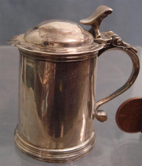 Appraisal: George I II silver miniature tankard marks badly worn tall