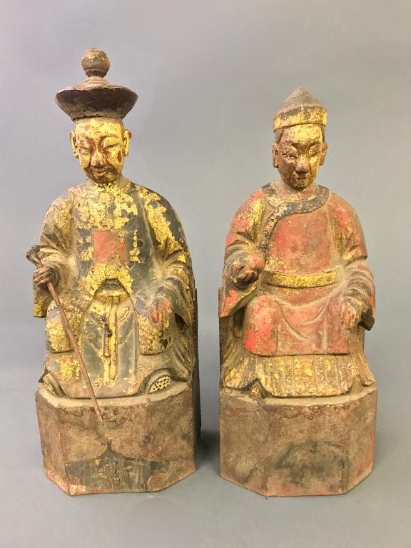 Appraisal: Two Korean Gilt and Painted Wood Seated Figures Two similar