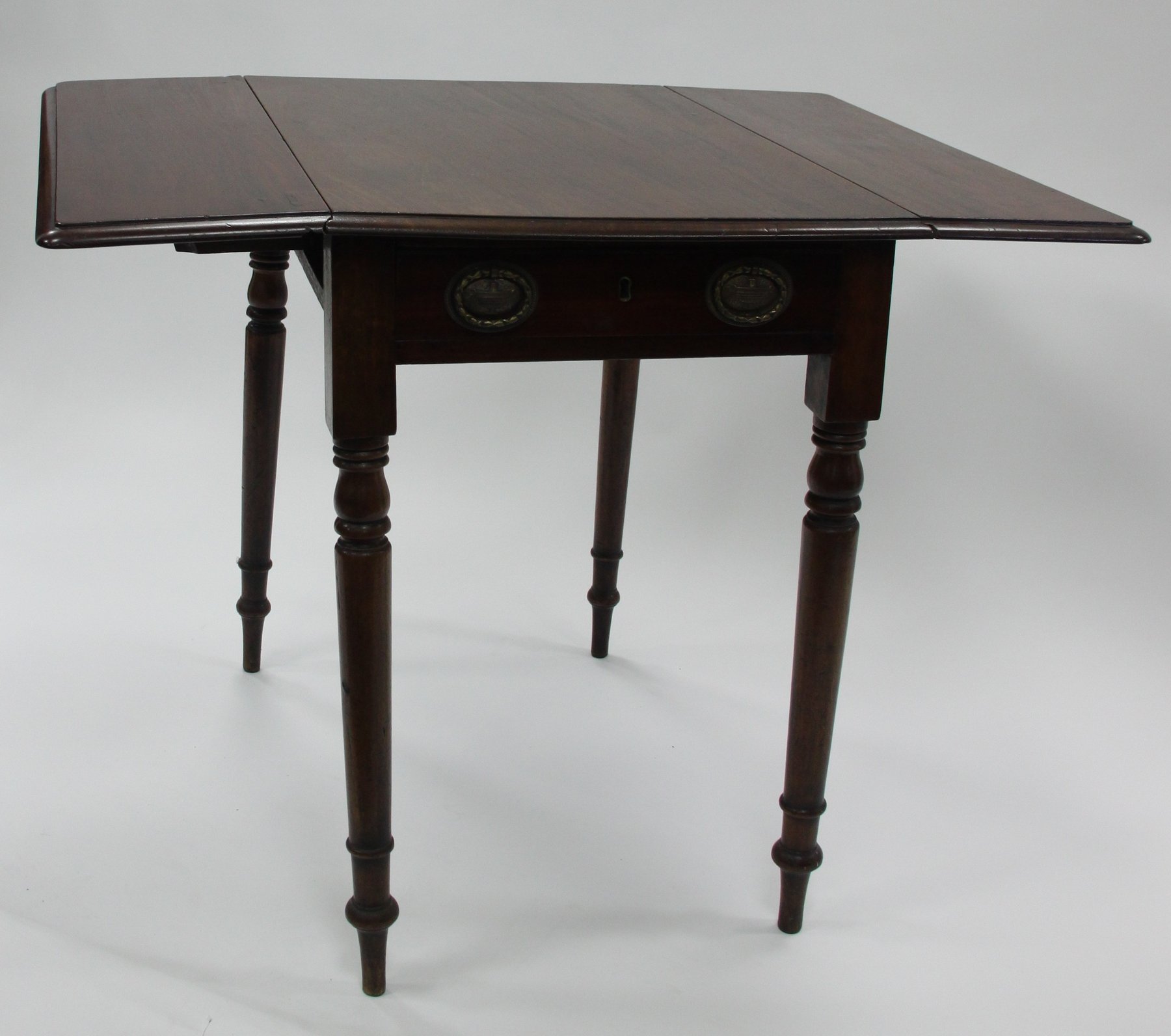 Appraisal: A George IV mahogany two-flap Pembroke table fitted a drawer