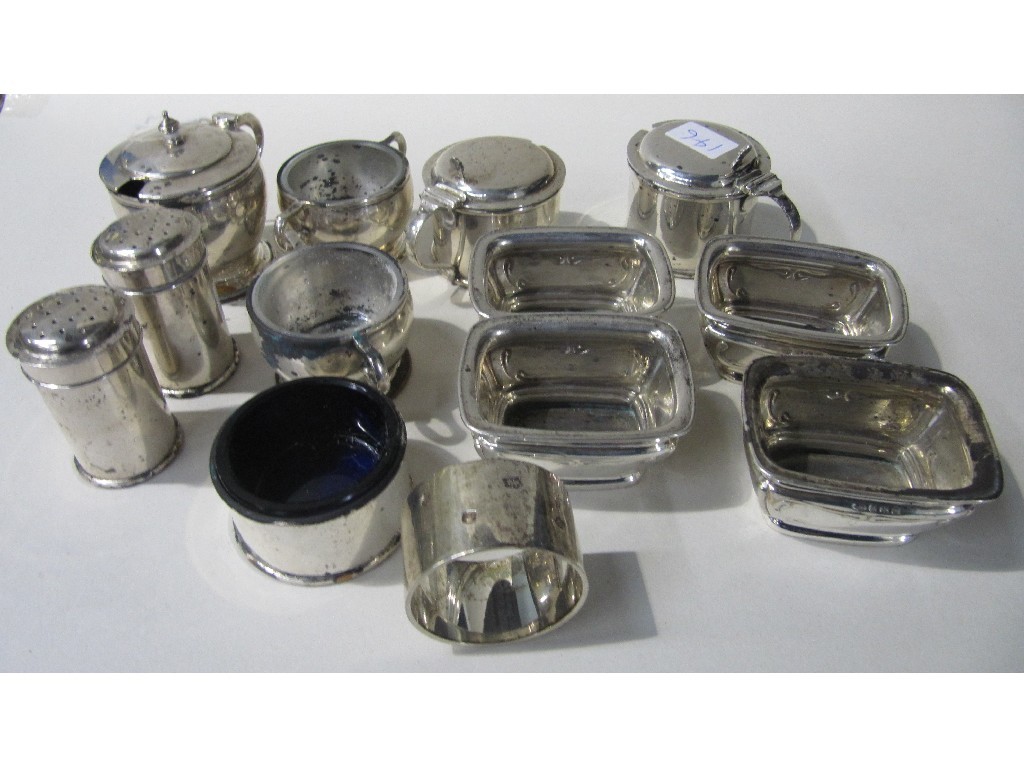 Appraisal: Lot comprising eight silver condiments a silver napkin ring and