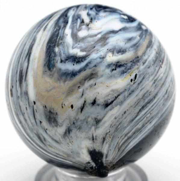 Appraisal: Large Chevron Marble Purple base with outer white bands some