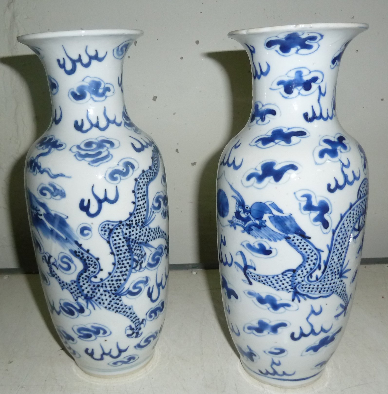 Appraisal: A pair of Chinese blue and white dragon vases cm