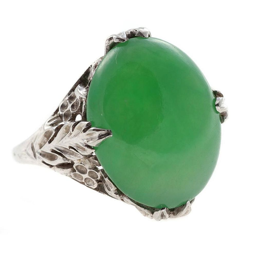 Appraisal: Jadeite Jade and k gold ring oval cabochon jadeite jade