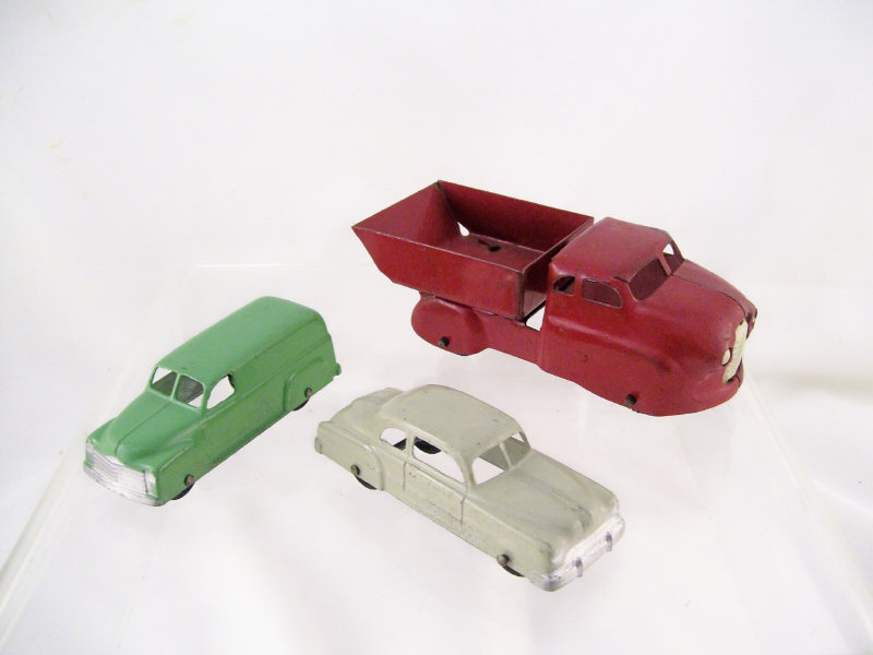 Appraisal: Pressed Steel Vehicles Includes Original red painted Wyandotte Toys dump