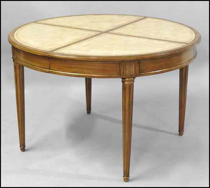 Appraisal: BAKER MAHOGANY AND EMBOSSED LEATHER ROUND DINING TABLE Table opens