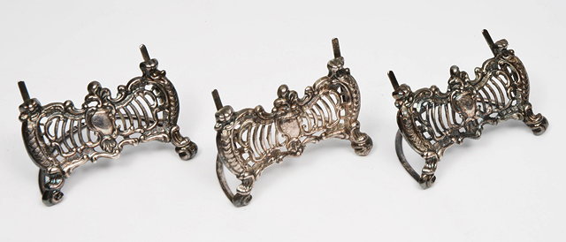 Appraisal: THREE LATE VICTORIAN SILVER MENU HOLDERS BY WILLIAM COMYNS each