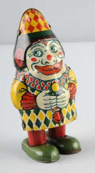 Appraisal: Tin Chein Clown Waddler Wind-Up Toy Description American Working Marked