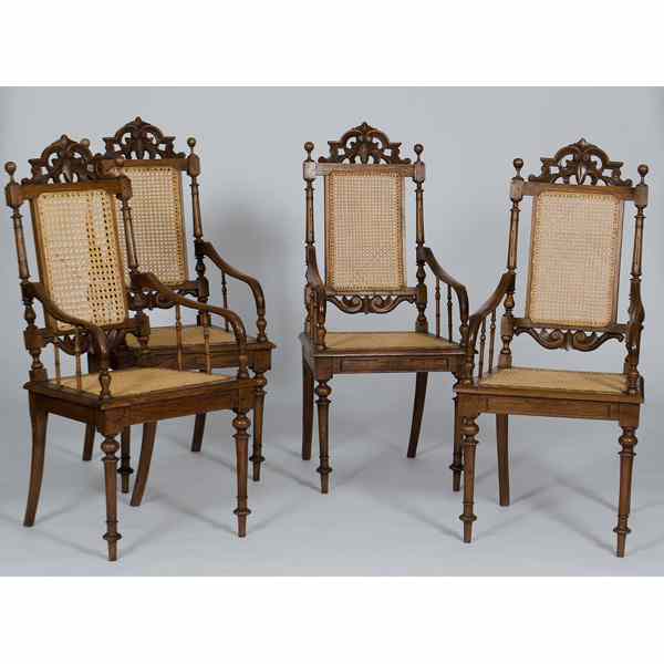 Appraisal: Caned Carved Oak Armchairs American th century A set of