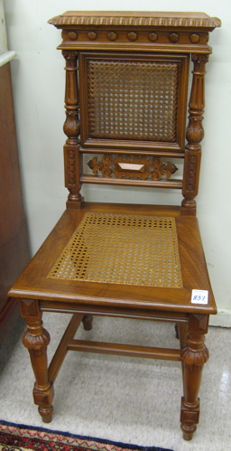 Appraisal: A PAIR OF HEAVY WALNUT SIDE CHAIRS German c with