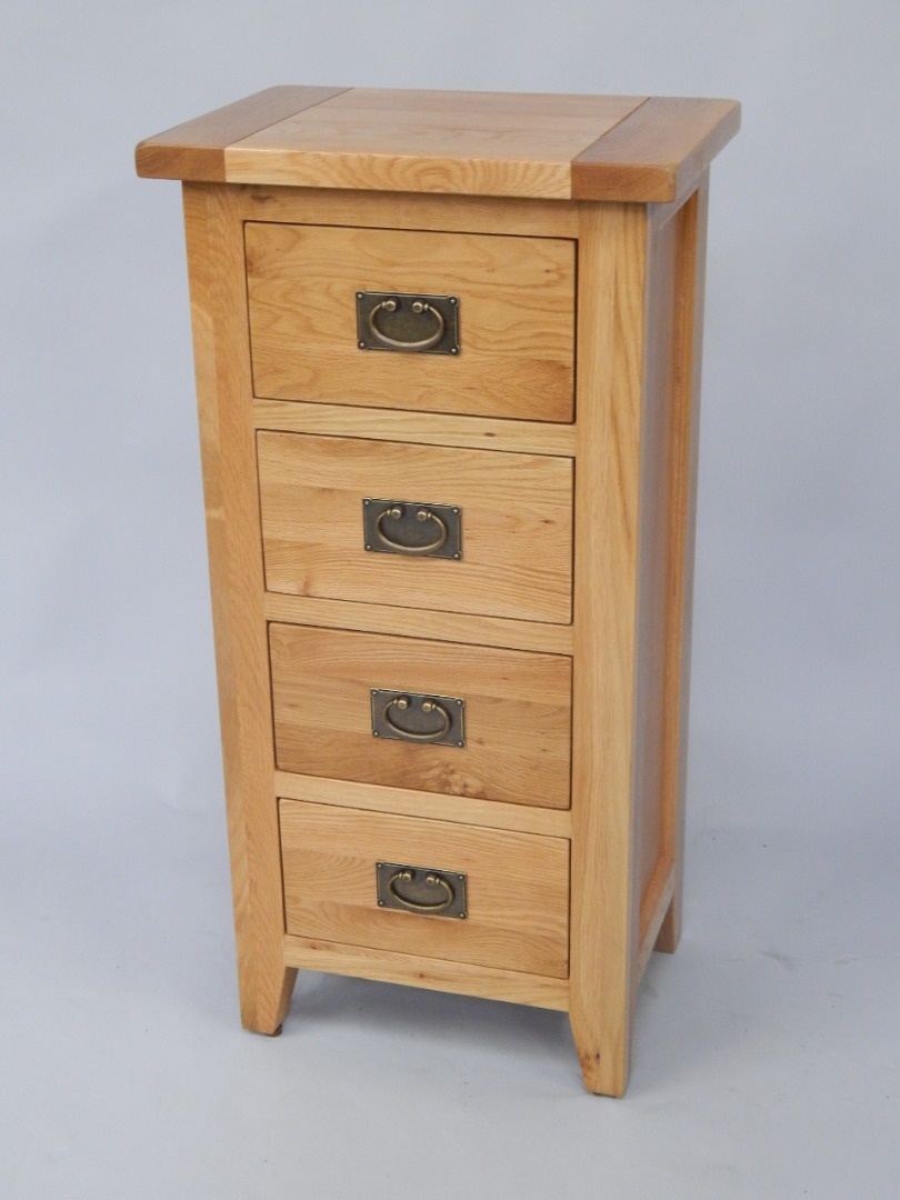 Appraisal: A modern narrow oak chest of drawers the rectangular top