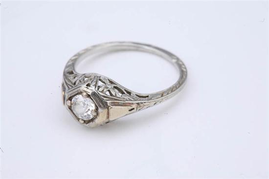 Appraisal: DIAMOND FILIGREE RING Ladies ring with quadrangle mounted old European