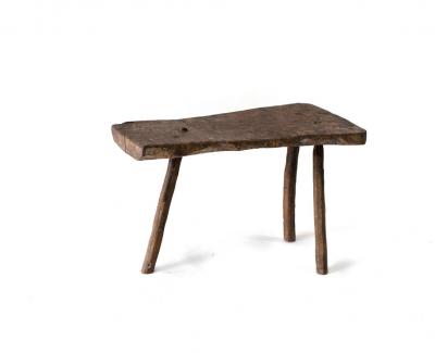 Appraisal: A primitive three-legged stool cm long