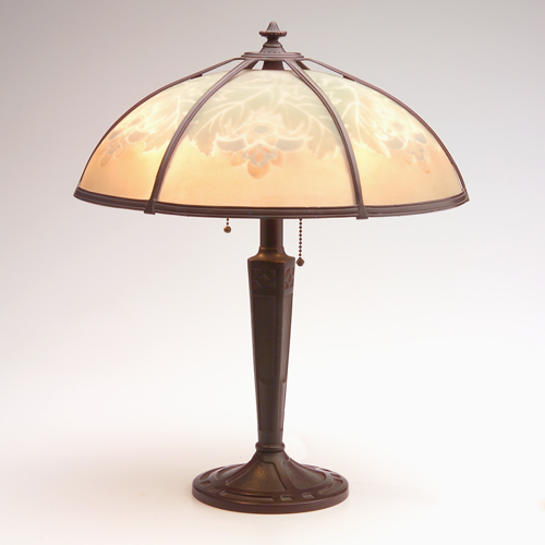 Appraisal: BRADLEY HUBBARD Table lamp its hemispherical shade reverse-painted with stylized