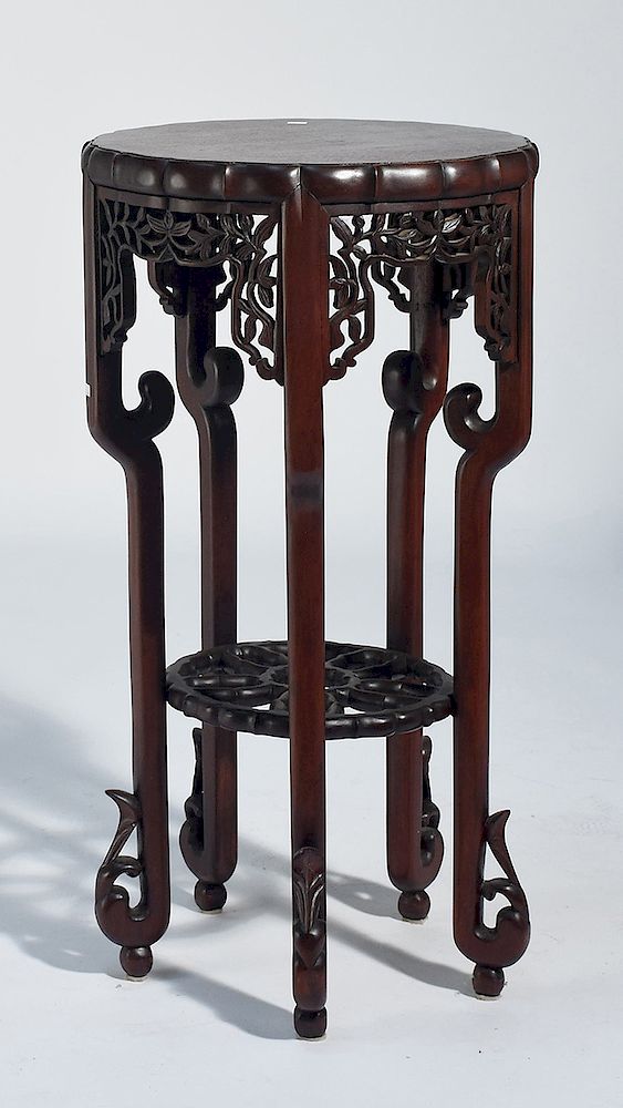 Appraisal: Chinese carved rosewood round stand Chinese carved rosewood round stand