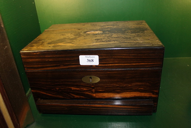 Appraisal: A VICTORIAN COROMANDEL TRAVELLING BOX with fitted interior