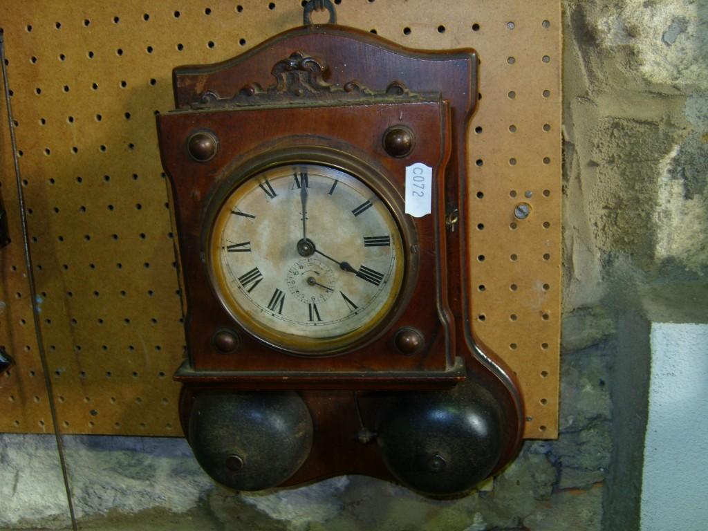 Appraisal: A small Edwardian wall clock with -day movement and alarm