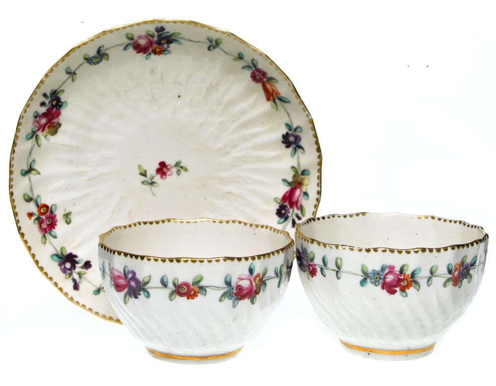 Appraisal: A PAIR OF CHELSEA-DERBY SPIRALLY FLUTED AND MOULDED TEA BOWLS