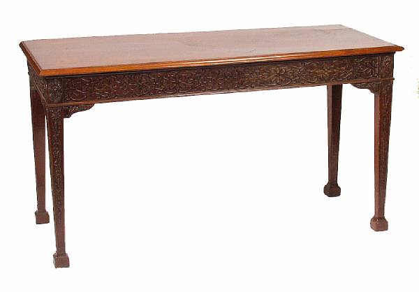 Appraisal: A George III style carved mahogany serving table height in