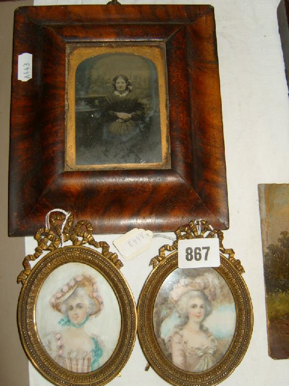 Appraisal: A pair of late th century miniature portraits of ladies