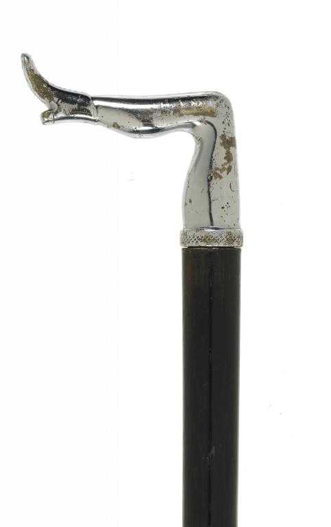 Appraisal: AN EBONY CANE the chromium plated brass handle in the