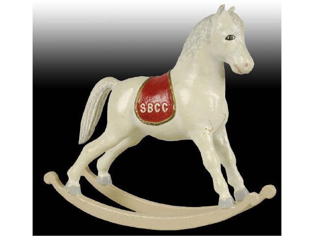 Appraisal: Cast Iron Rocking Horse Bank Description Made by Knerr in