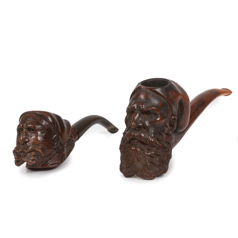 Appraisal: CIVIL WAR A group of folk art pipes carved in