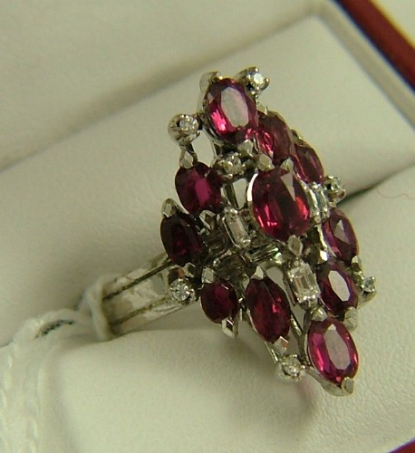 Appraisal: RUBY DIAMOND AND FOURTEEN KARAT WHITE GOLD RING set with