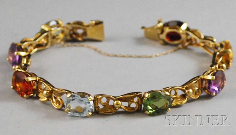 Appraisal: kt Gold and Multicolored Gemstone Bracelet the flexible link bracelet