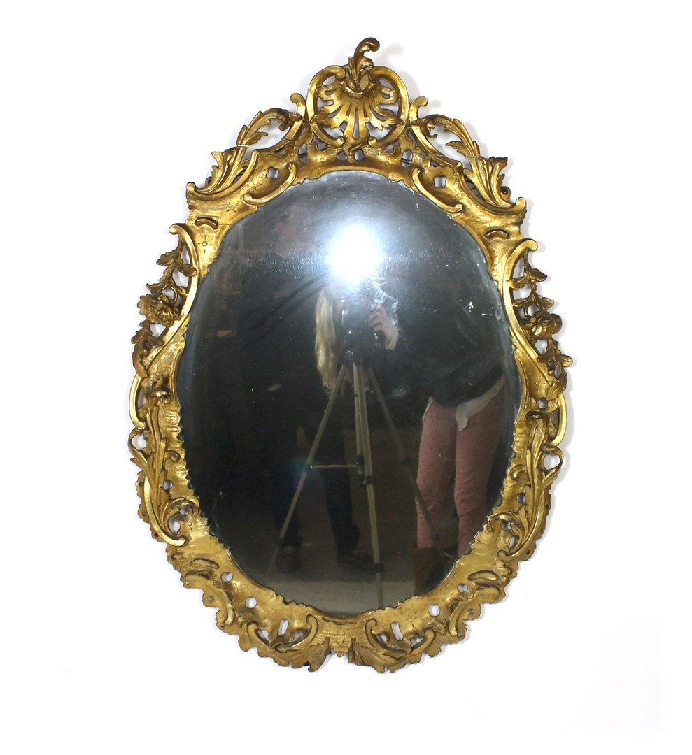 Appraisal: A th century Italian gilt framed oval wall mirror with