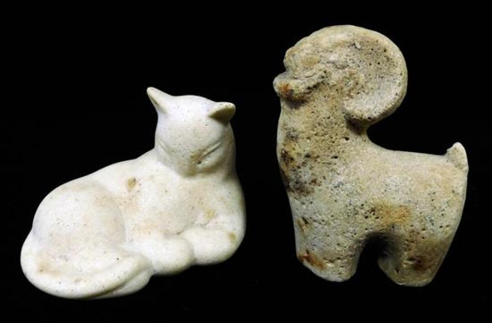 Appraisal: SCULPTURE Primitive or Direct carved stone cat and ram early