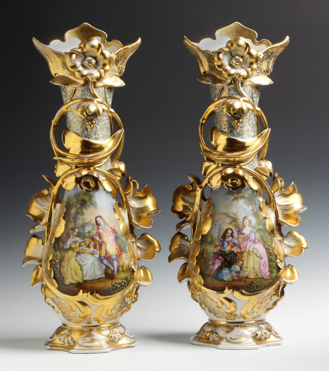 Appraisal: Pair of Hand Painted Paris Vases th cent Courtyard scenes