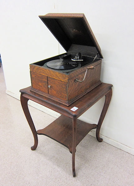 Appraisal: VICTROLA DISC PHONOGRAPH ON OAK LAMP TABLE Victor Talking Machine