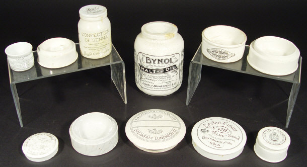 Appraisal: Collection of advertising pot lids bottles and bases transfer printed