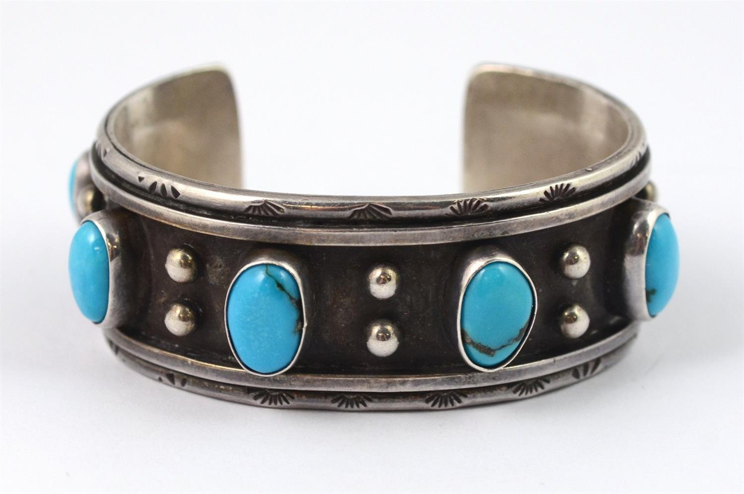 Appraisal: s Navajo sterling cuff bracelet set with cabochon turquoise stones