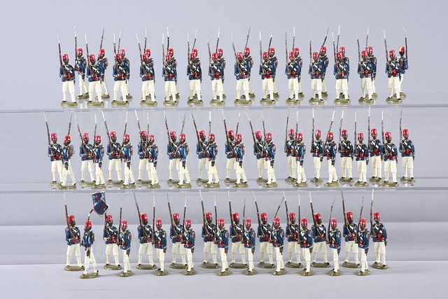 Appraisal: Lot of metal figures representing Egyptian Infantry marching gloss paint