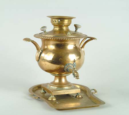 Appraisal: BRASS SAMOVAR WITH UNDER TRAY Decorative kettle form with two