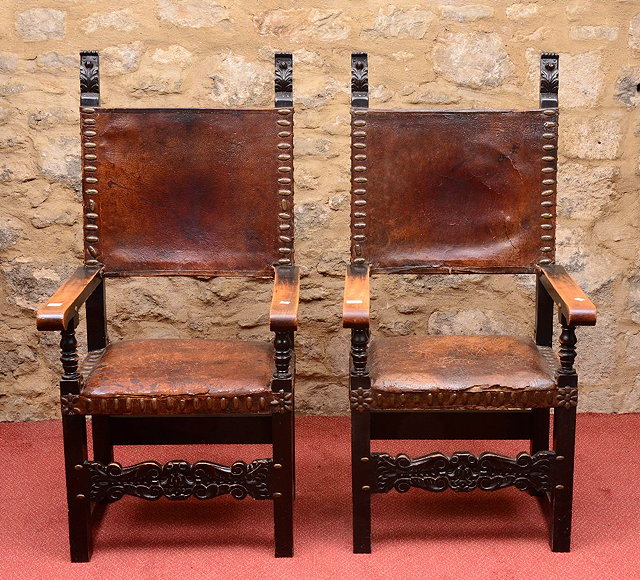 Appraisal: A PAIR OF TH CENTURY STYLE OAK ELBOW CHAIRS with