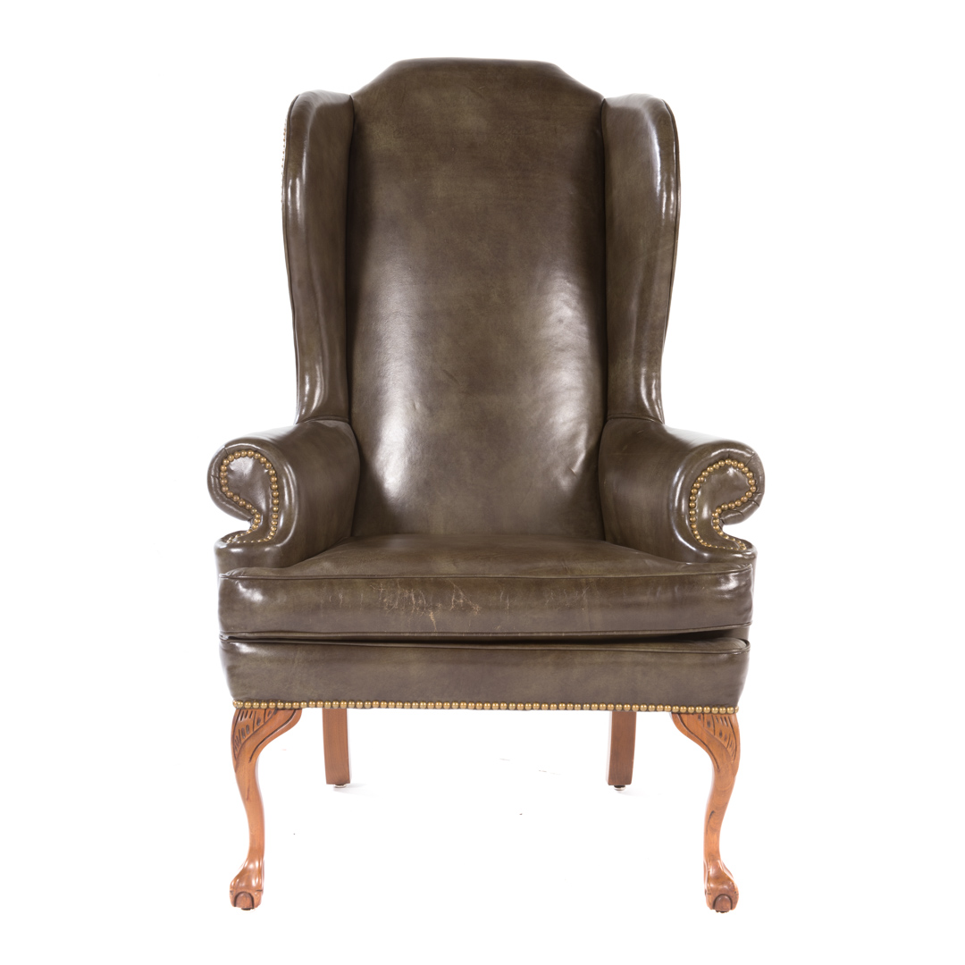 Appraisal: George III style leather upholstered wing chair th century upholstered