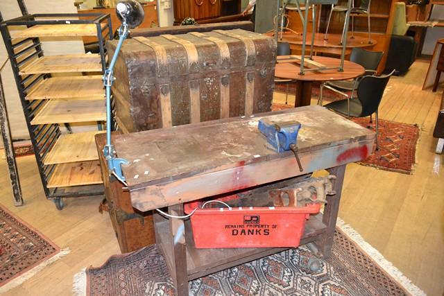 Appraisal: AN INDUSTRIAL WORK BENCH WITH VICE LAMP ON LARGE INDUSTRIAL