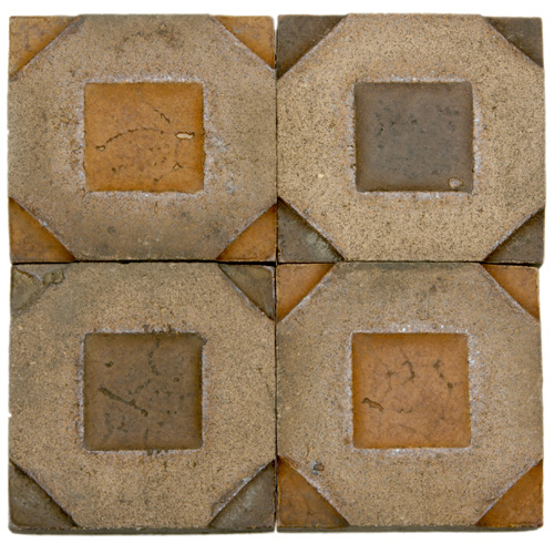 Appraisal: GRUEBY Eighty-six geometric tiles with raised octagonal pattern of unglazed