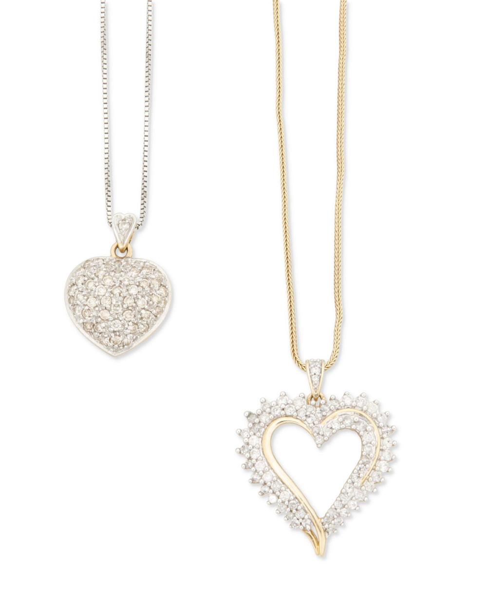 Appraisal: TWO DIAMOND HEART PENDANT NECKLACESTwo diamond heart pendant necklaces k