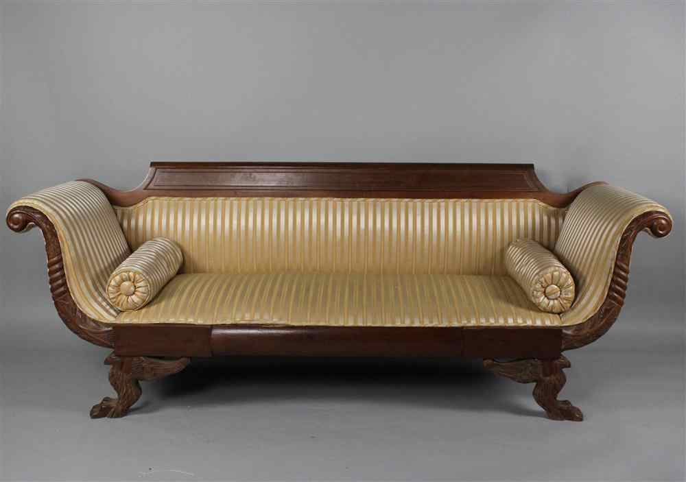 Appraisal: AMERICAN CLASSICAL STYLE SOFA WITH YELLOW STRIPE UPHOLSTERY having an