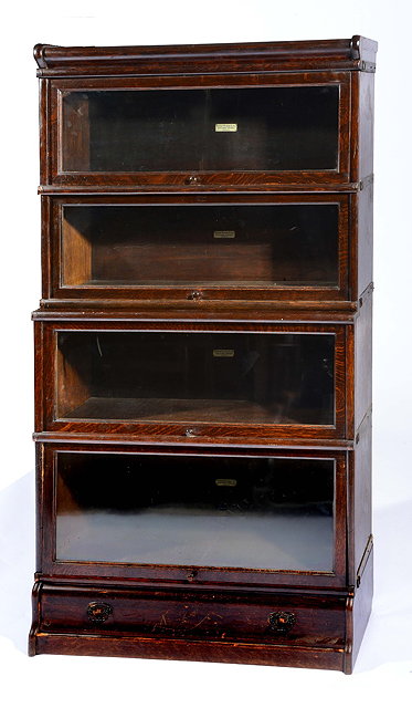 Appraisal: Three Globe Wernicke oak glazed front bookcasesof sectional form including